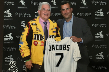 Who’s The Guy In The Yellow M&Ms Jacket Behind Home Plate At Sox Games?